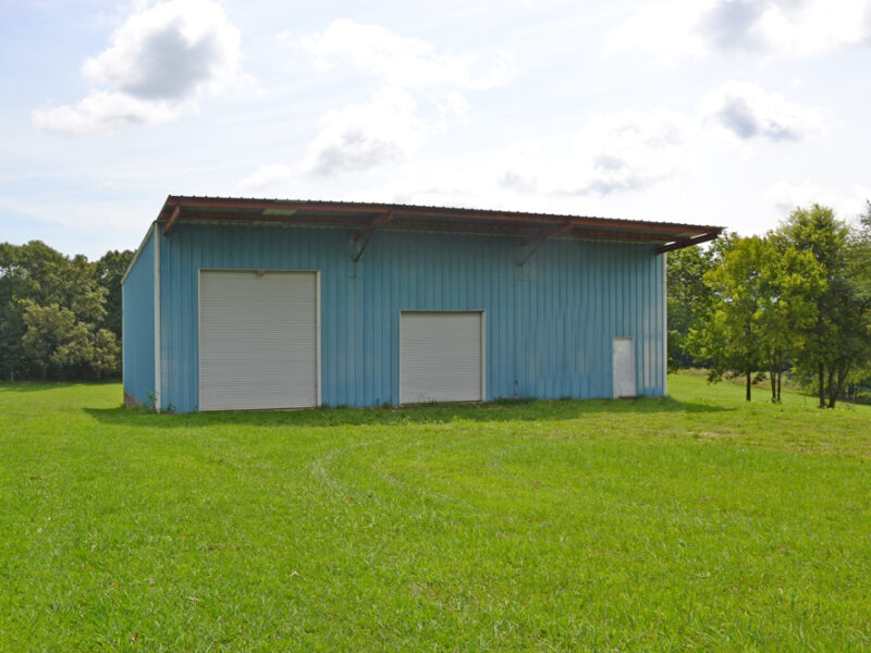 6.18 Residential Acres in City of Sweetwater w/ 2,400 sf Metal Warehouse Building